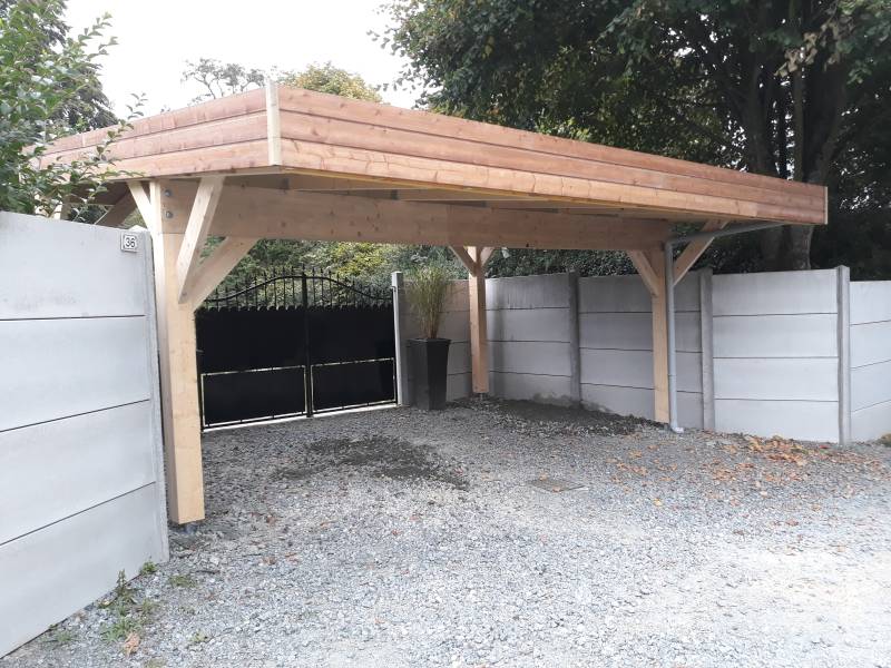 Construction de carport bois sur mesure à Fécamp : réalisation pour stationnement extérieur durable et esthétique moderne